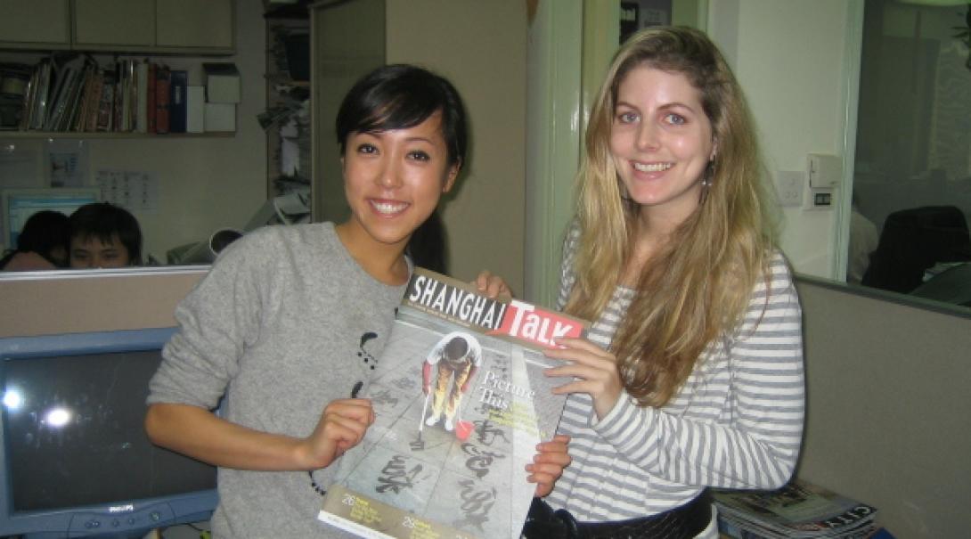 A Projects Abroad intern showcases a magazine A journalism intern in China holds up a magazine at her placement